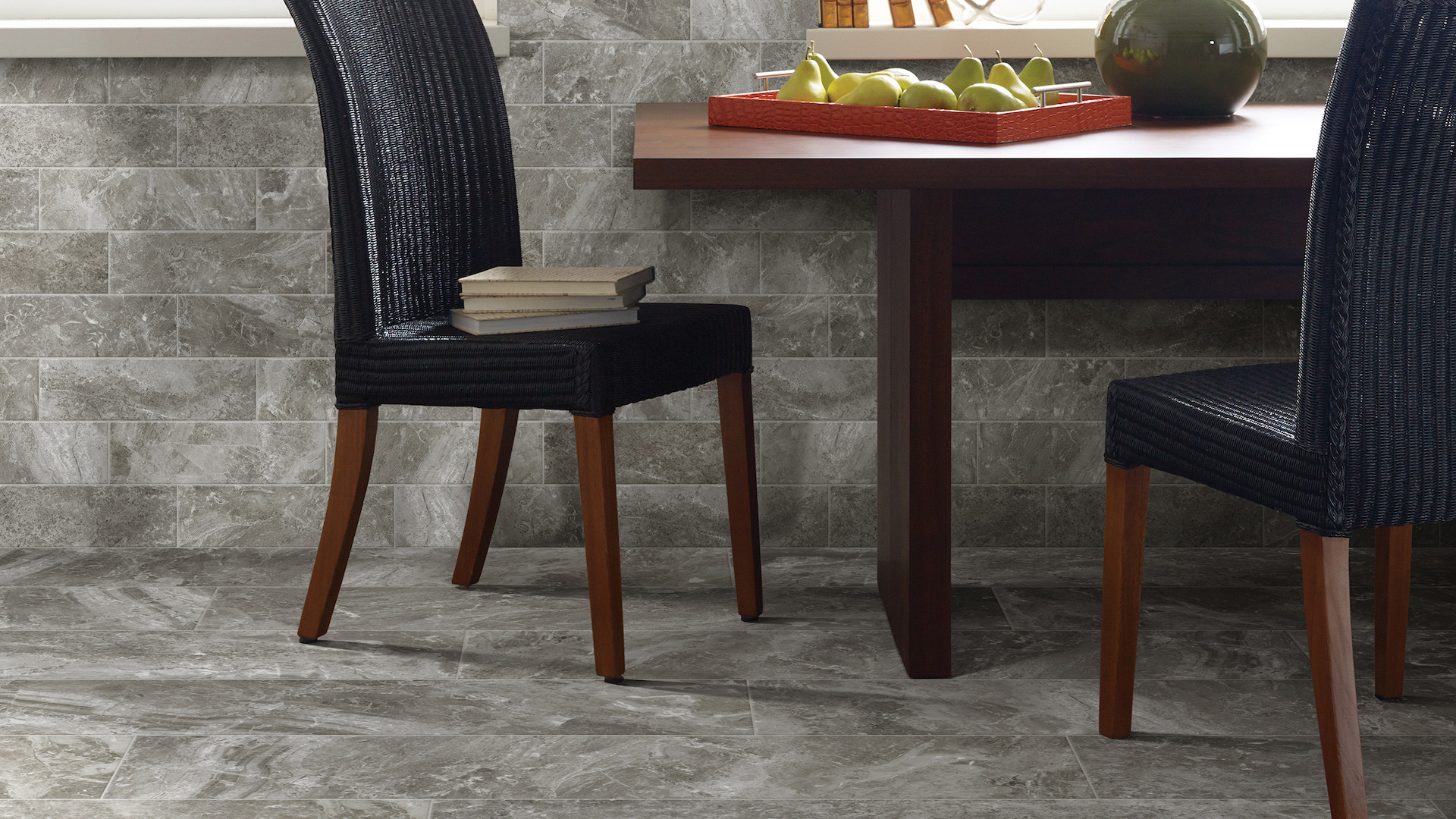 Commercial tile flooring with a table and chairs by large windows
