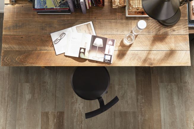 wood look tile flooring in a rustic office space
